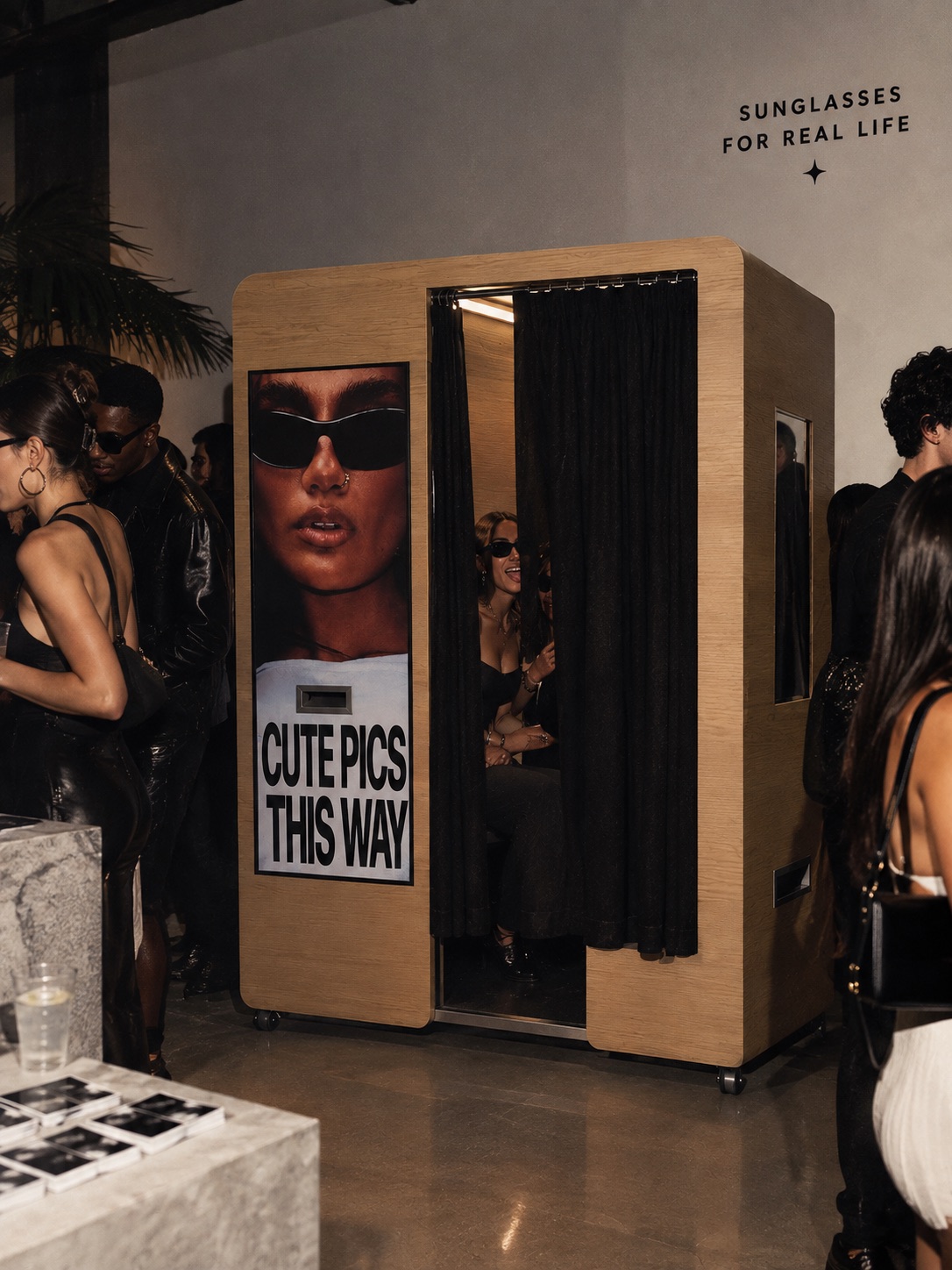 Sunglasses brand activation photo booth with guests inside